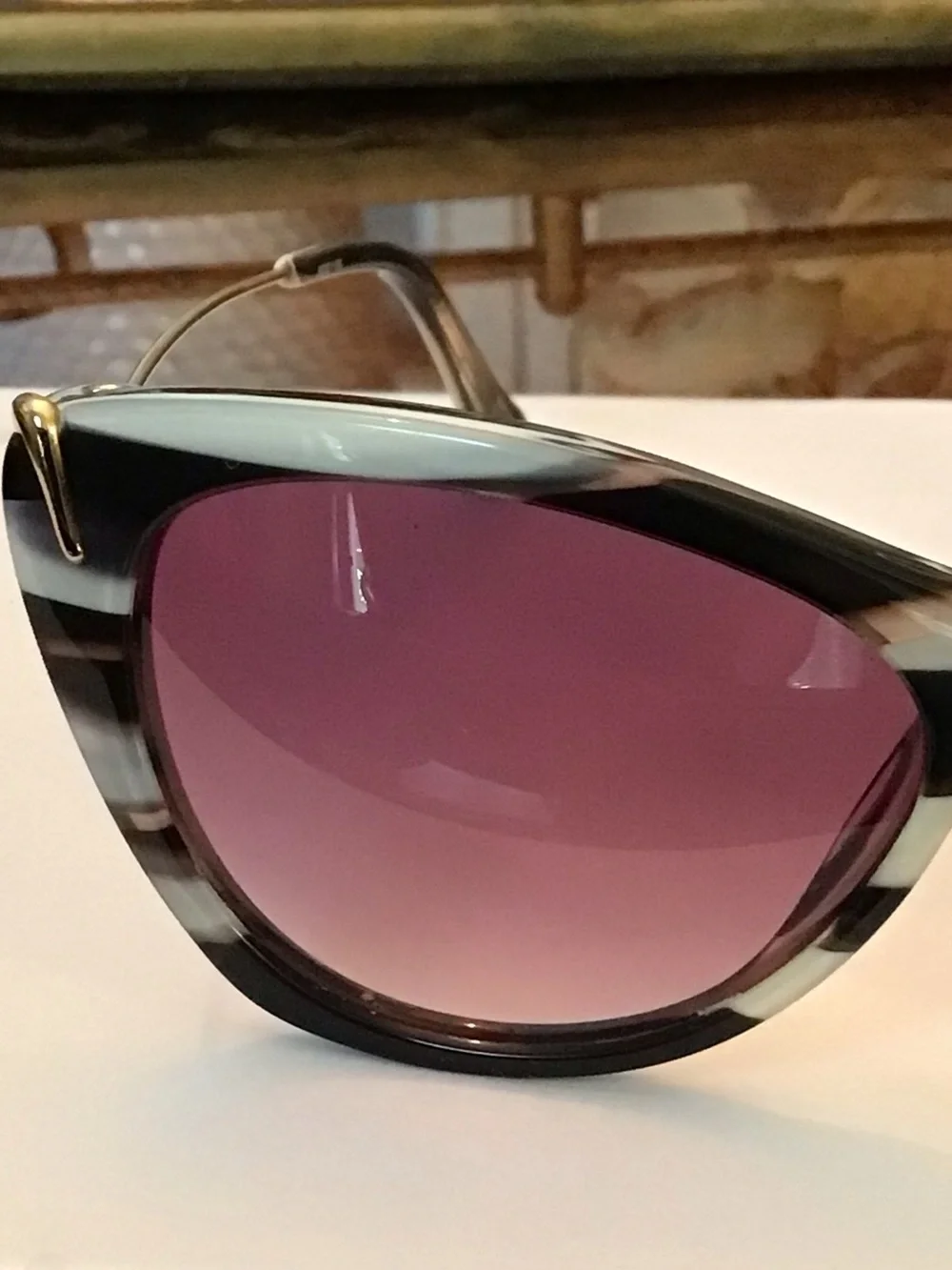 Elizabeth and James Black & White Striped Cat-Eye Sunglasses with Purple Lenses